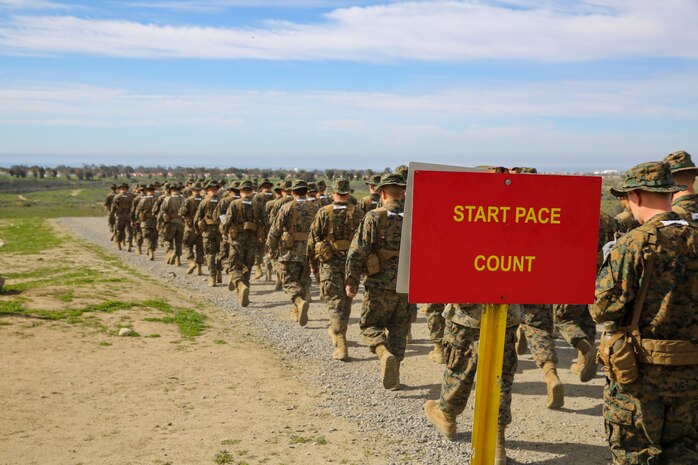 Recruits of Echo Company, 2nd Recruit Training Battalion, track their pace count before they start the Land Navigation Course at Edson Range, Marine Corps Base Camp Pendleton, Calif., Jan. 22.  After getting their pace count, they were paired up, given a set of coordinates that identified where their ammunition cans were located and sent out into the course to find them.