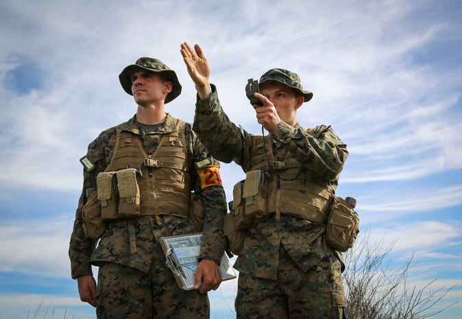 Recruits Jacob R. Kottman and Chainey L. Ellis, (left to right) Platoon 2105, Echo Company, 2nd Recruit Training Battalion, use their compass to ensure they’re going the correct direction during the Land Navigation Course at Edson Range, Marine Corps Base Camp Pendleton, Calif., Jan. 22.  Recruits had to utilize teamwork and confidence in each other’s skills while making their way through the course.
