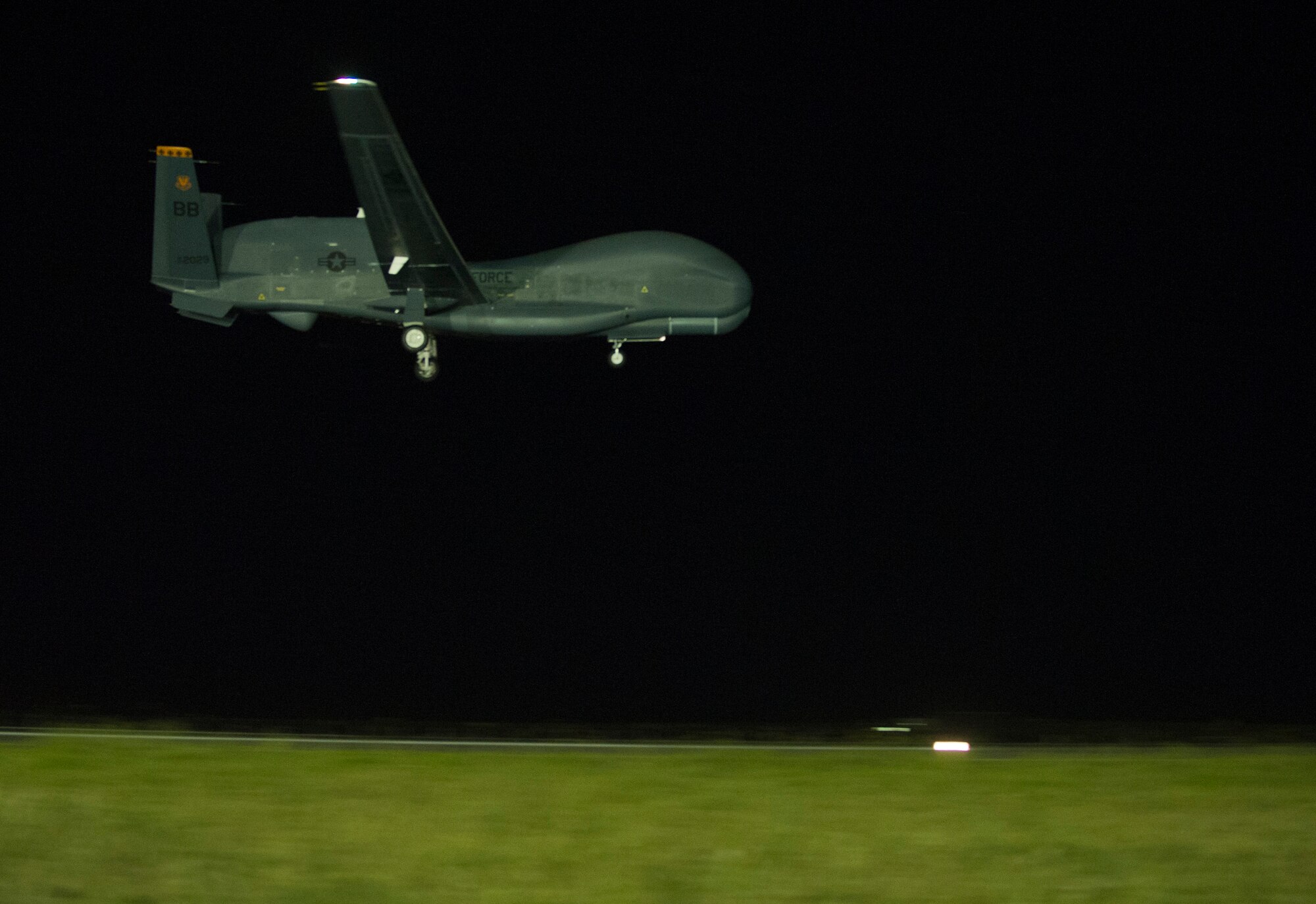 An RQ-4 Global Hawk prepares to land at Avalon Airport, Victoria, Australia marking the first historic landing in Australia in preparation for the 2015 Australian International Airshow and Aerospace & Defense Exposition, Feb. 21, 2015. Approximately 100 U.S. personnel will showcase U.S. military aircraft, including the Air Force's F-22 Raptor, F-16 Fighting Falcon, RQ-4 Global Hawk, B-52 Stratofortress, and KC-135 Stratotanker and the Navy's P-8A Poseidon at the airshow. (U.S. Air Force photo/Sheila deVera)