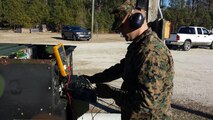 Marines in BEEEST 2-15 conduct practical application on the Mobile Electric Power 805B, which is a 30kW, 60Hz generator set.