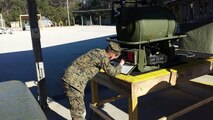 A Marine in BEEEST 3-15 conducts practical application on a Tactical Water Distribution System.