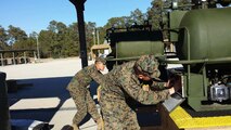 Marines in BEEEST 3-15 conduct practical application on a Tactical Water Distribution System.