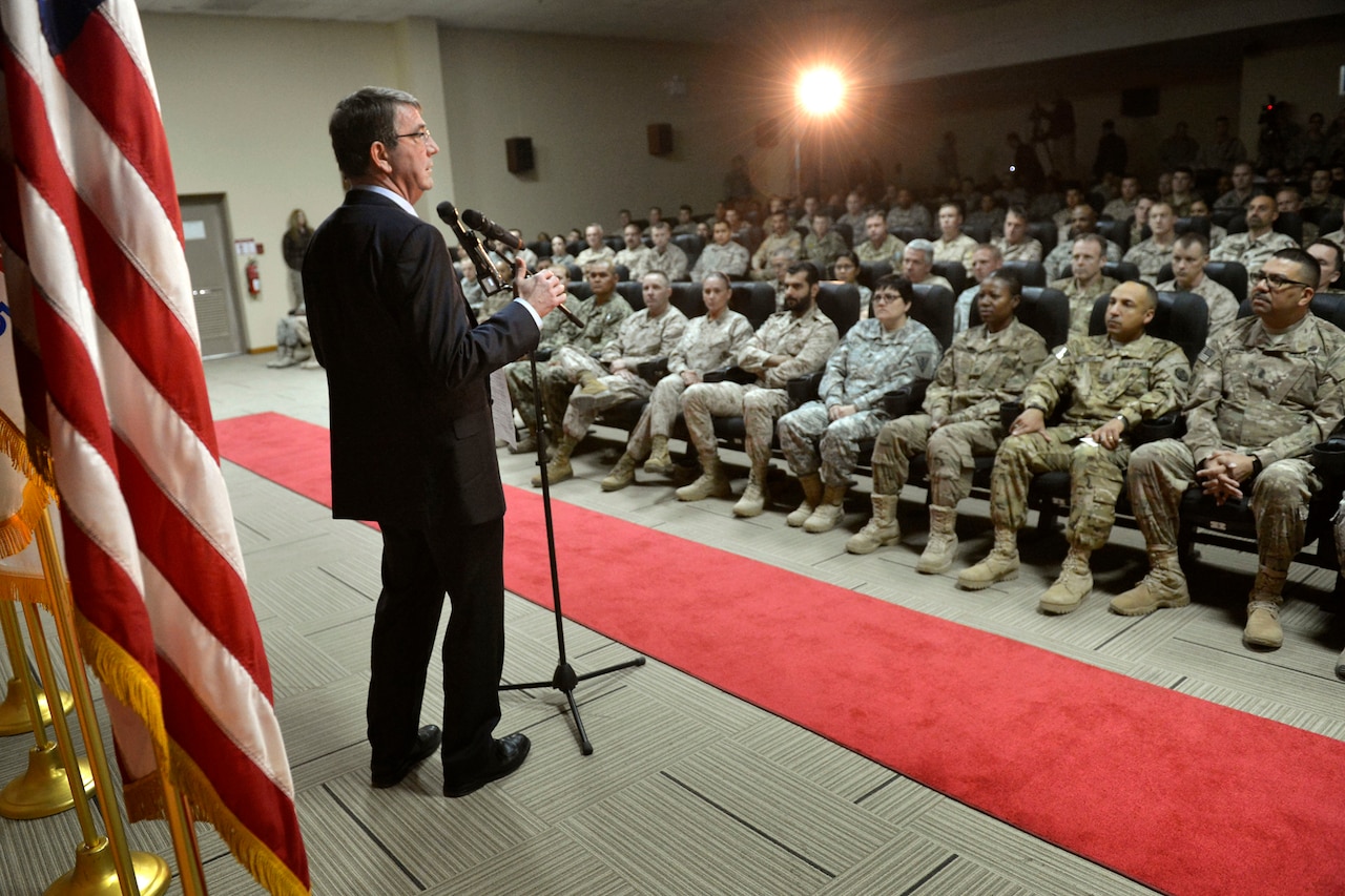 U.S. Defense Secretary Ash Carter delivers remarks at a troop event on Camp Arifjan, Kuwait, Feb. 23, 2015. DoD photo by Glenn Fawcett