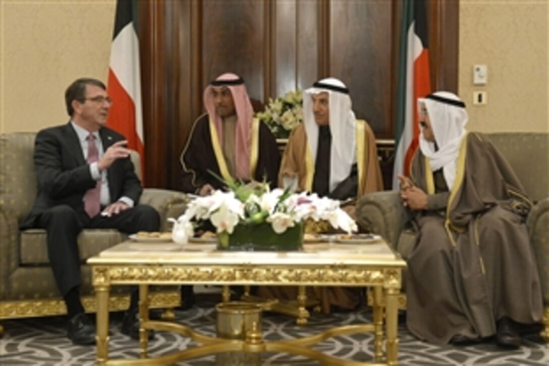 U.S. Defense Secretary Ash Carter, left, meets with the emir of Kuwait Sabah Al Ahmad Al Jaber Al Sabah in Kuwait City, Feb. 23, 2015. 