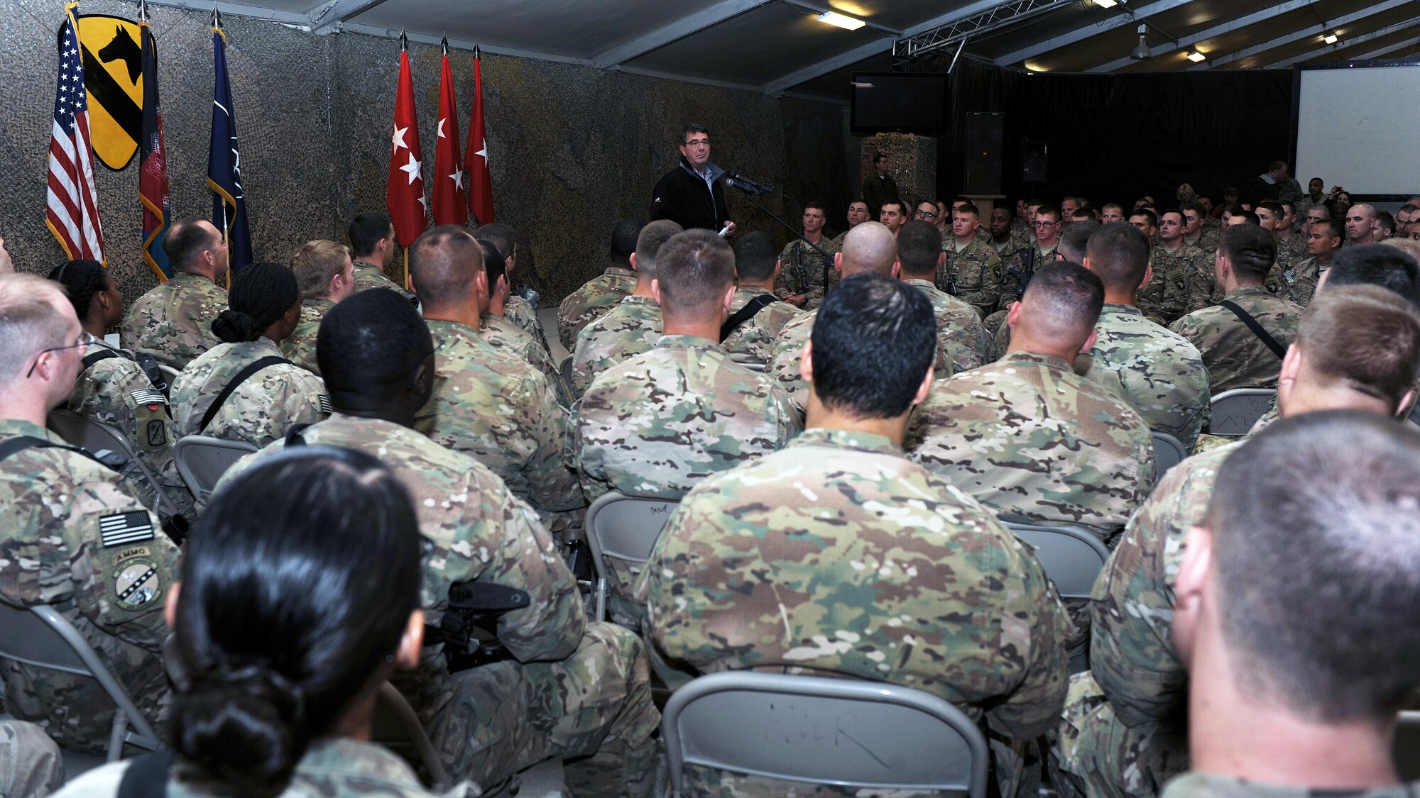Secretary of Defense, the Hon. Ashton Carter, speaks to U.S. Air Force Airmen and U.S. Army Soldiers during a visit to Kandahar Airfield, Afghanistan Feb. 22, 2015. Having sworn in only five days prior, the trip was Carter’s first official visit to Afghanistan as defense secretary, and his first opportunity to convey his appreciation to servicemembers fulfilling the Resolute Support Mission downrange. (U.S. Air Force photo by Staff Sgt. Whitney Amstutz/released)