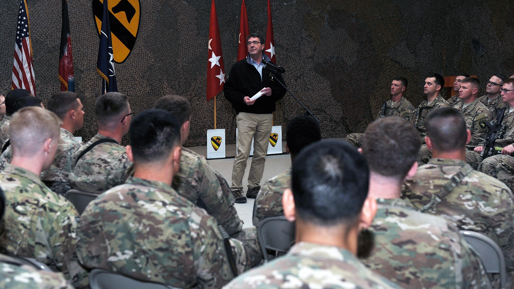 Secretary of Defense, the Hon. Ashton Carter, speaks to U.S. Air Force Airmen and U.S. Army Soldiers during a visit to Kandahar Airfield, Afghanistan Feb. 22, 2015. Having sworn in only five days prior, the trip was Carter’s first official visit to Afghanistan as defense secretary, and his first opportunity to convey his appreciation to servicemembers fulfilling the Resolute Support Mission downrange. (U.S. Air Force photo by Staff Sgt. Whitney Amstutz/released)
