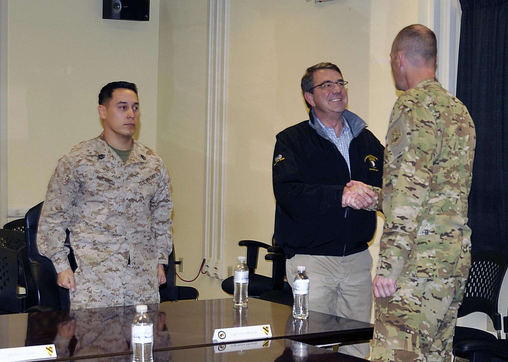 Secretary of Defense, the Hon. Ashton Carter, shakes hands with a U.S. Air Force Airman during a luncheon at Kandahar Airfield, Afghanistan Feb. 22, 2015. Having sworn in only five days prior, the trip was Carter’s first official visit to Afghanistan as defense secretary, and his first opportunity to convey his appreciation to servicemembers fulfilling the Resolute Support Mission downrange. (U.S. Air Force photo by Capt. Jennifer Bosco/released)