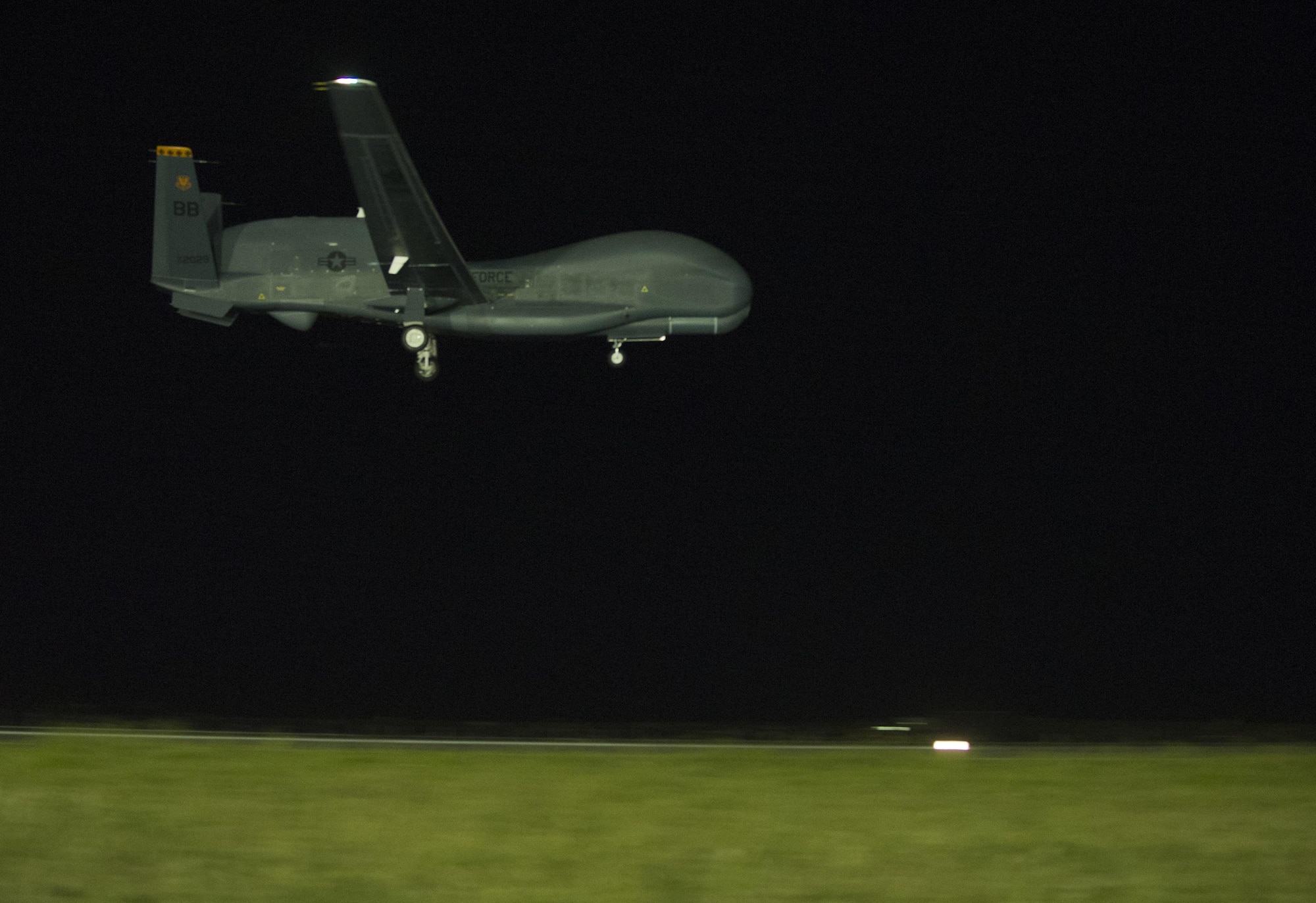 An U.S. Air Force RQ-4 Global Hawk prepares to land Feb. 21, 2015, at Avalon Airport in Victoria, Australia, marking the first historic landing in Australia in preparation for the 2015 Australian International Airshow and Aerospace & Defense Exposition. Approximately 100 U.S. personnel will showcase U.S. military aircraft, including the Air Force's F-22 Raptor, F-16 Fighting Falcon, RQ-4 Global Hawk, B-52 Stratofortress, and KC-135 Stratotanker, and the Navy's P-8A Poseidon at the airshow. (U.S. Air Force photo/Sheila deVera)