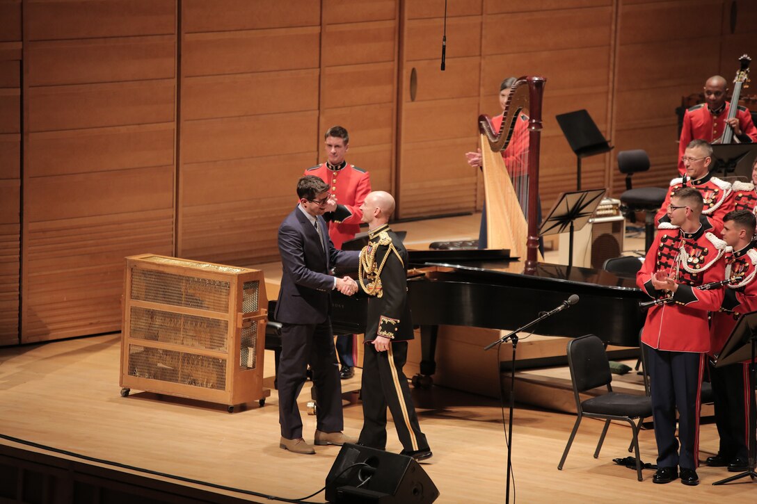 On Feb. 23, 2015, the Marine Band performed at the Music Center at Strathmore. The program, called Time Capsule 1945: The 70th Anniversary of the End of WWII," featured guest narrator Jim Lehrer, the world premiere of Adam Schoenberg's American Symphony, and music from "South Pacific." (U.S. Marine Corps photo by Master Sgt. Kristin duBois/released)