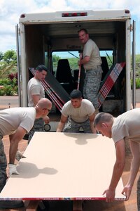 Members of the 131st Civil Engineering Squadron of the Missouri Air National Guard unloaded drywall to take to a construction location at Camp Pineapple 808 in Wahiawa, Hawaii as part of their efforts to help a non-profit corporation as part of an Innovative Readiness Training mission on June 7, 2010.