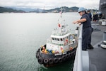 SEPANGGAR, Malaysia (Jan. 22, 2015) - Boatswain’s Mate 3rd Class Janie Saldivar, a native of De Queen, Ark., stands by on the forecastle of the dock landing ship USS Comstock (LSD 45) while the ship is moored for a port visit. Comstock, part of the Makin Island Amphibious Ready Group, is on a deployment with the 11th Marine Expeditionary Unit (MEU) to promote peace and freedom of the seas by providing security and stability in the U.S. 7th Fleet area of operations. 