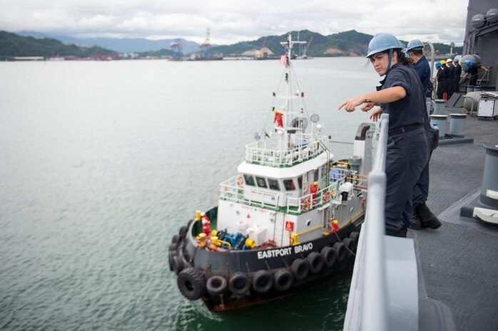 SEPANGGAR, Malaysia (Jan. 22, 2015) - Boatswain’s Mate 3rd Class Janie Saldivar, a native of De Queen, Ark., stands by on the forecastle of the dock landing ship USS Comstock (LSD 45) while the ship is moored for a port visit. Comstock, part of the Makin Island Amphibious Ready Group, is on a deployment with the 11th Marine Expeditionary Unit (MEU) to promote peace and freedom of the seas by providing security and stability in the U.S. 7th Fleet area of operations. 