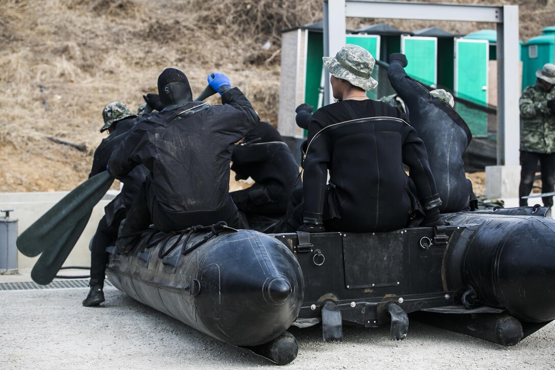 Republic of Korea Marines practice using their oars in unison while operating a combat rubber raiding craft Feb. 5 during Korean Marine Exchange Program 15-3 in Gimpo, Gyeonggi Province, Republic of Korea. Although the craft has an engine, the ROK Marines commonly use oars to reduce noise or save fuel. The ROK Marines trained alongside U.S. Marines during KMEP 15-3, enhancing the combat readiness and interoperability of the two forces. The U.S. Marines are reconnaissance men with Alpha Company, 3rd Reconnaissance Battalion, 3rd Marine Division, III Marine Expeditionary Force. The ROK Marines are force reconnaissance men with 2nd Battalion, 2nd Marine Division.
