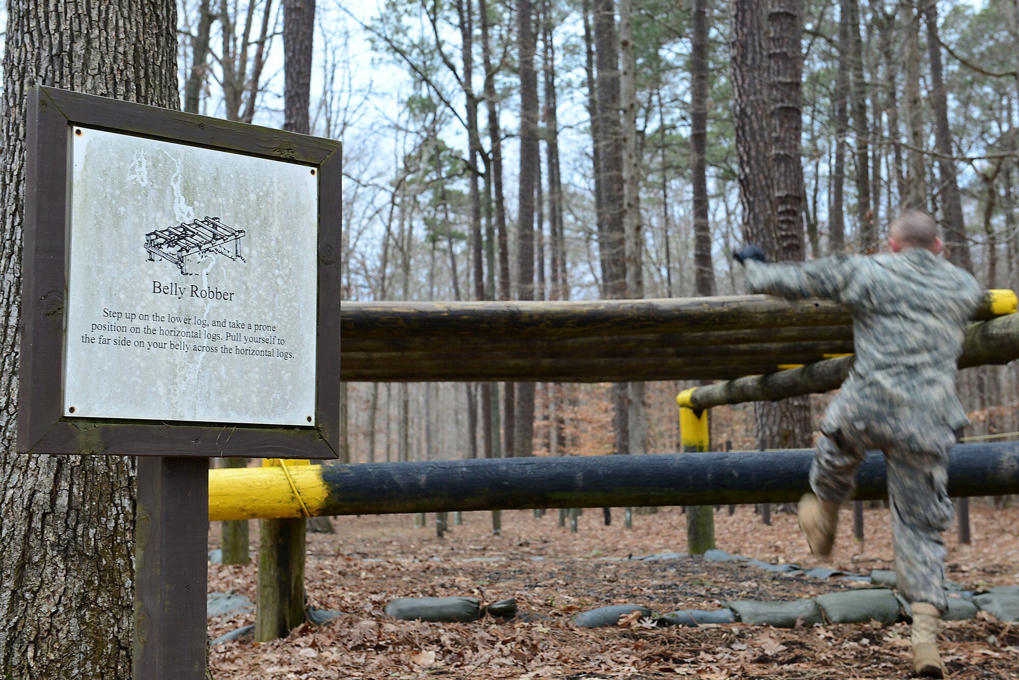 U.S. Army Staff Sgt. Cory Wrieden, Alpha Company, 1st Battalion, 222nd Aviation Regiment, 128th Aviation Brigade platoon sergeant, begins the confidence course at Fort Eustis, Va., Feb. 12, 2015. Wrieden completed the course as part of the annual 128th Avn. Bde. noncommsioned officer and Advanced Individual Training platoon sergeant competition. (U.S. Air Force photo by Senior Airman Kimberly Nagle/Released)
