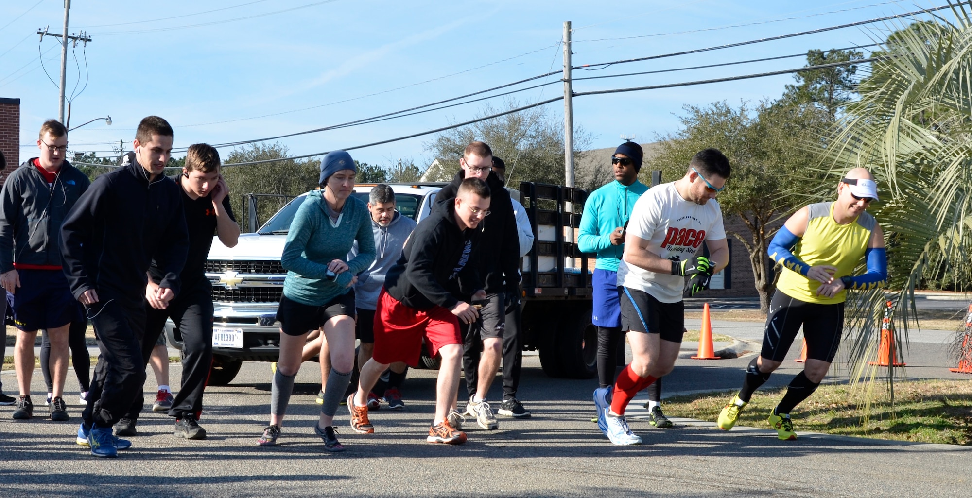 Participants prepare to start the run portion of the inaugural 5K Fun Run and Polar Plunge hosted by Sam's Fitness Center on Joint Base Charleston-Weapons Station, Feb. 21, Following the run, participants then had to swim across the New Wave Aquatic Center pool at Sam's Fitness Center. The temperature for the day was in the low to mid 60s. (Courtesy photo/ Jessica Donnelly) 
