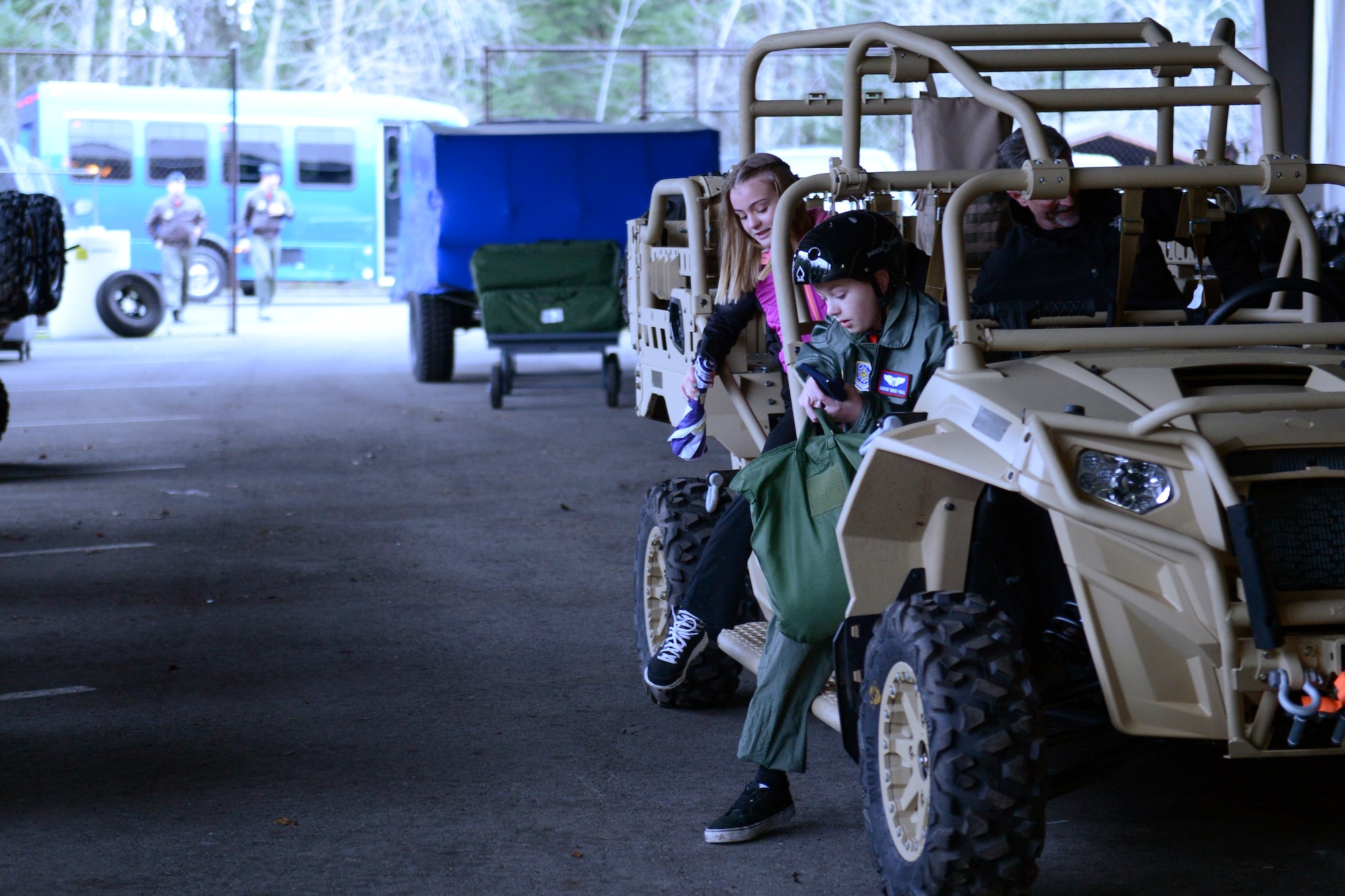 Carver Faull, a participant in the Pilot for a Day program, and his family begin the events of the day at the 22nd Special Tactics Squadron, Feb. 20, 2015, at Joint Base Lewis-McChord, Wash. The Pilot for a Day program gives medically challenged children, and children in medical remission from or currently suffering with catastrophic illnesses, a full day to experience life as a Team McChord member. (U.S. Air Force photo/Senior Airman Rebecca Blossom)