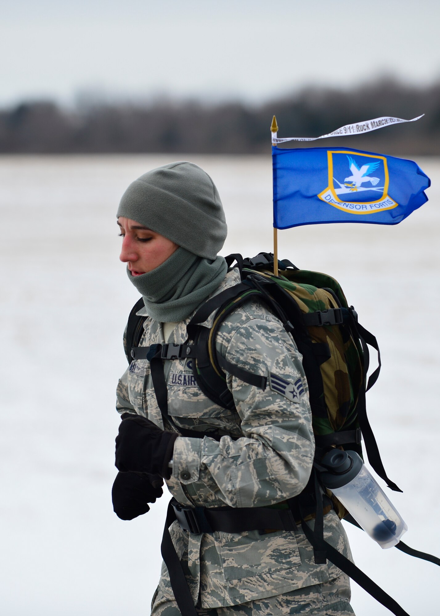 Senior Airman Angela Gaul, 436th Security Forces Squadron response force member, competes in the 16th Annual Security Forces Ruck March Feb. 21, 2015, at Dover Air Force Base, Del. Gaul ran 6.2 miles with a 30-pound ruck sack in memory of the Korean War Battle of Chosin Reservoir. (U.S. Air Force photo/Airman 1st Class William Johnson)  