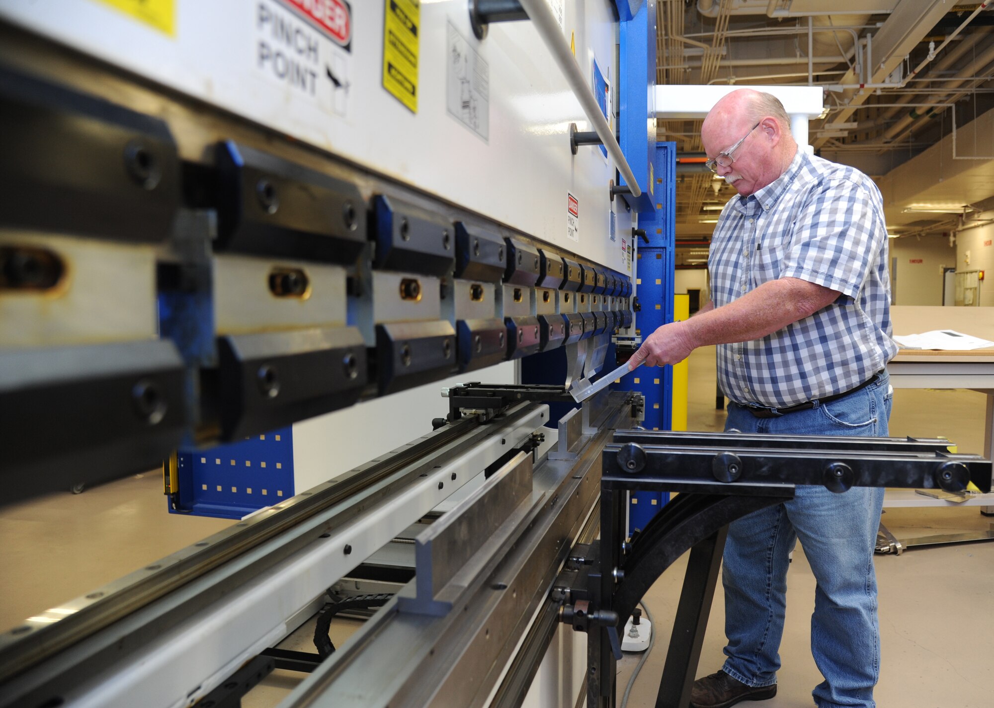 Tom Capers, 81st Training Support Squadron machinist and welder, fabricates training devices for the 333rd Training Squadron Feb. 23, 2015, at the Trainer Development Center, Keesler Air Force Base, Miss.  (U.S. Air Force photo by Kemberly Groue)