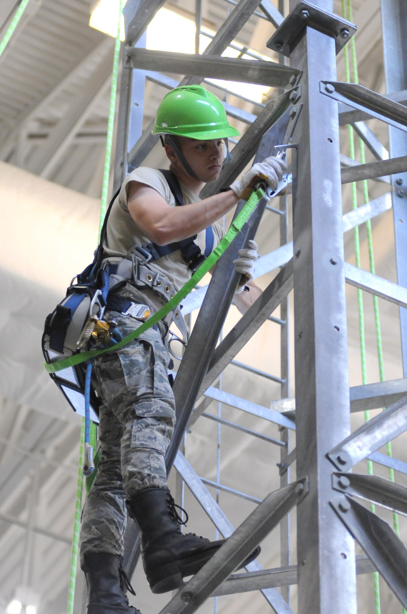 Airman 1st Class Brian Doran, 338th Training Squadron student, performs maintenance on an antenna tower during an airfield systems course Feb. 18, 2015, at Matero Hall, Keesler Air Force Base, Miss.  (U.S. Air Force photo by Kemberly Groue)