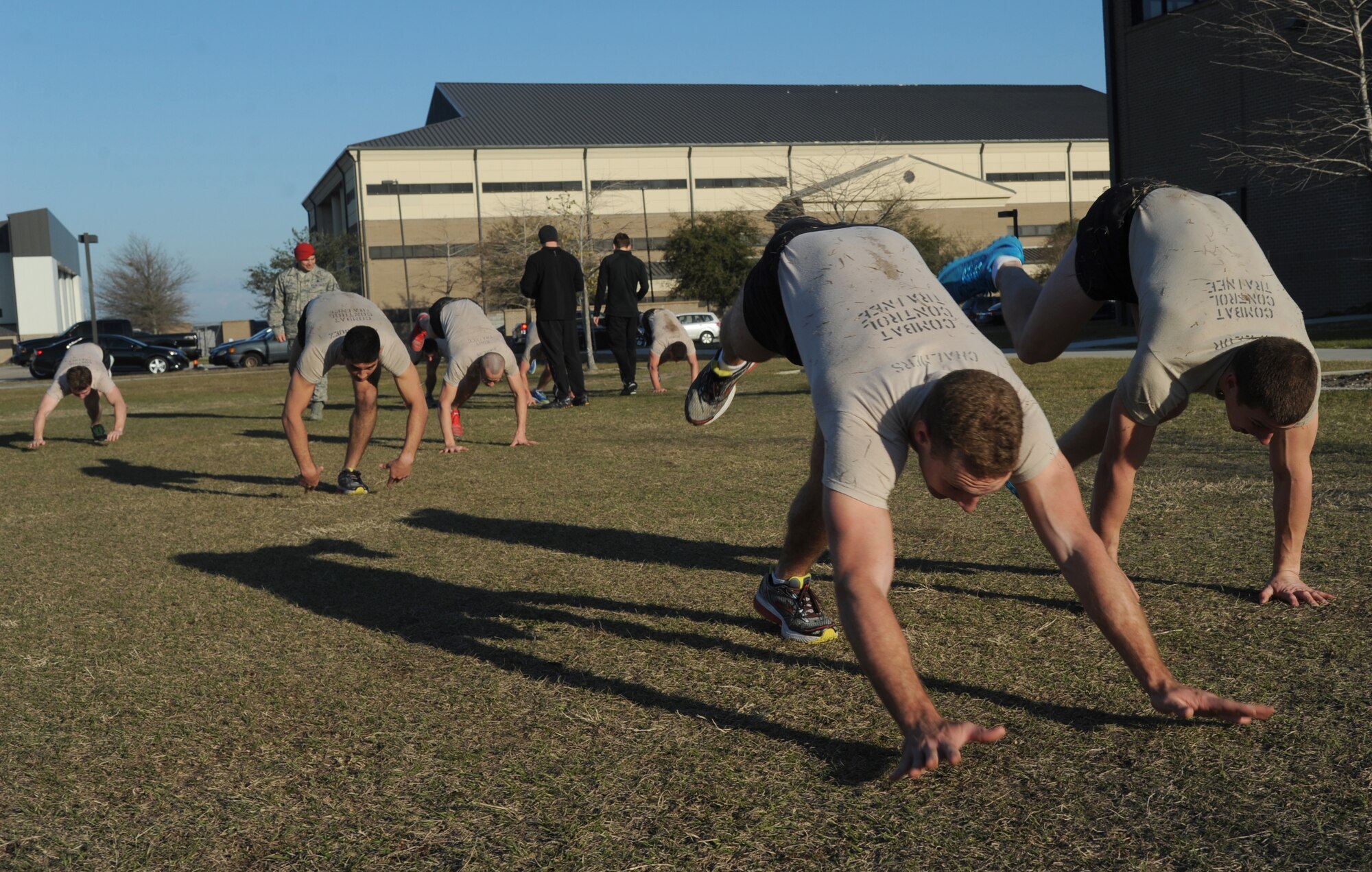 Trainees from the 334th Training Squadron combat control course and the 335th TRS special operations weather course participate in a physical training session Feb. 20, 2015, at Keesler Air Force Base, Miss.  (U.S. Air Force photo by Kemberly Groue)
