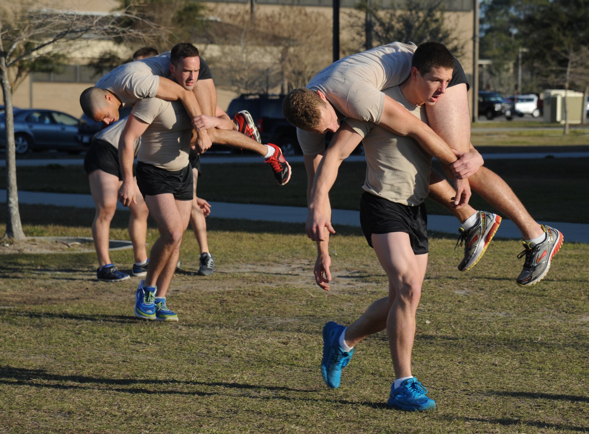 Trainees from the 334th Training Squadron combat control course and the 335th TRS special operations weather course participate in a physical training session Feb. 20, 2015, at Keesler Air Force Base, Miss.  (U.S. Air Force photo by Kemberly Groue)