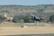 A 48th Fighter Wing F-15E Strike Eagle takes off from Royal Air Force Lakenheath, England, Feb. 24, 2015. The Liberty Wing’s forward presence and ready forces execute missions now in support of regional and global operations. (U.S. Air Force photo by Airman 1st Class Trevor T. McBride/Released)