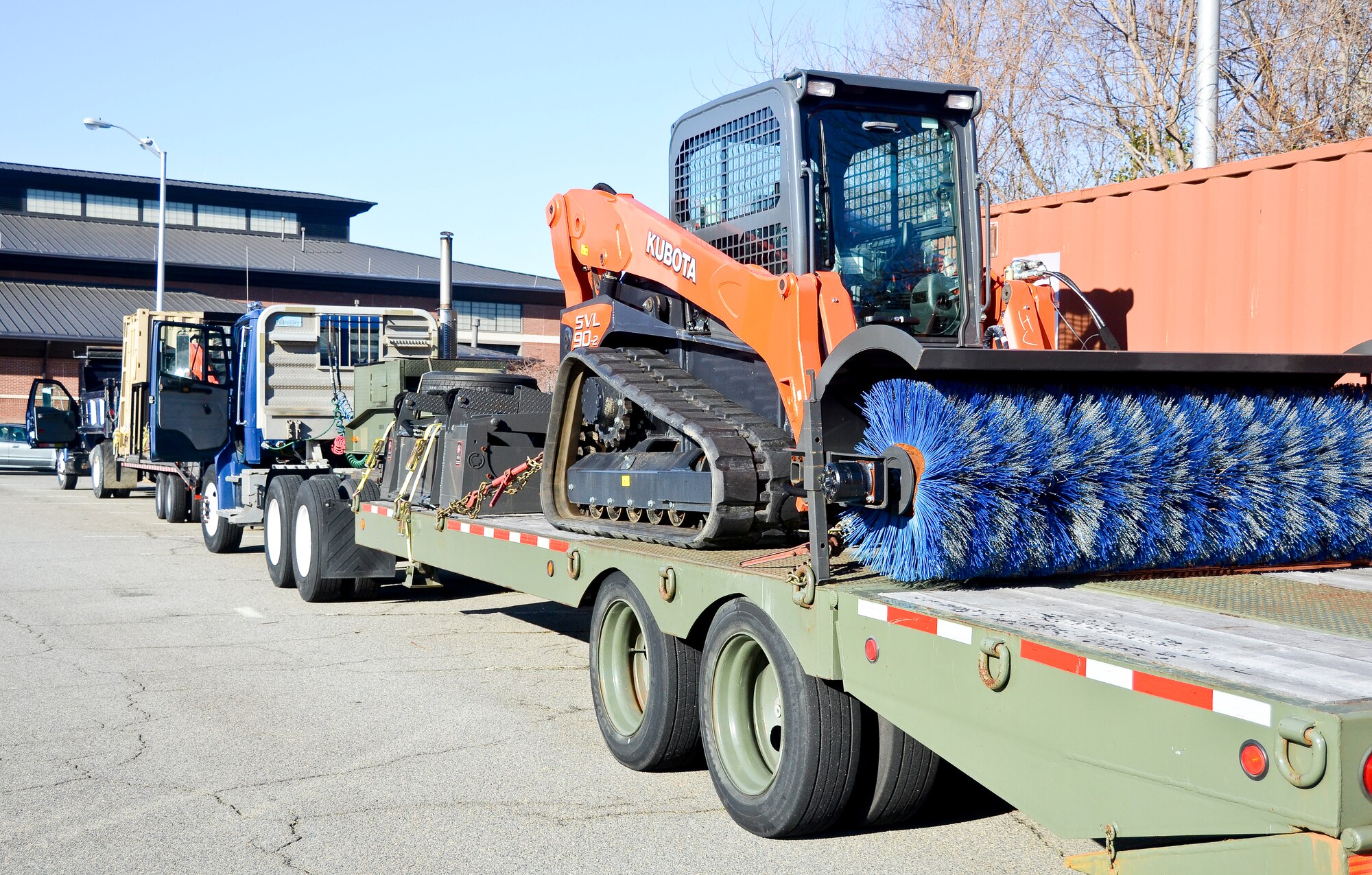 The 116th Civil Engineering Squadron (CES), Georgia Air National Guard has two flat-bed trucks loaded with snow and debris removal equipment in preparation for movement to Dobbins Air Reserve Base in response to the Defense Support of Civil Authorities (DSCA) preparation for the potential of inclement weather, Robins Air Force Base, Ga., Feb. 18, 2015. The CES supports the DSCA by utilizing military assets and personnel when authorized by the governor.  The CES provides initial route clearance in response to natural and man-made disasters. (U.S. Air National Guard photo by Tech. Sgt. Regina Young/released) 

 
