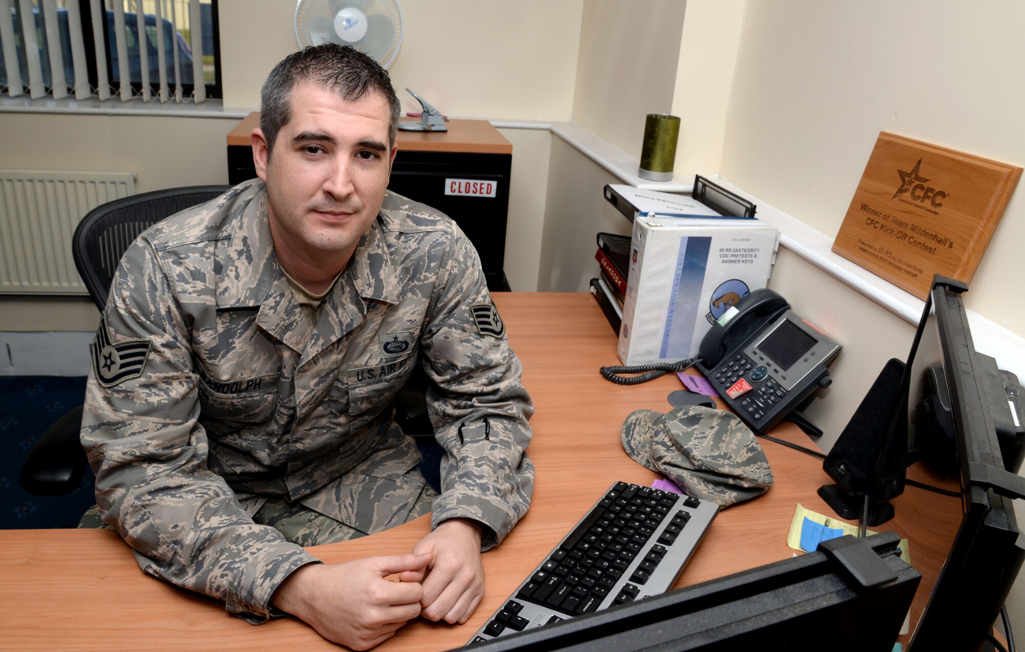 U.S. Air Force Staff Sgt. Jeremy Randolph, 95th Reconnaissance Squadron NCO in charge of commanders support staff from Shawnee, Okla., poses for a photo Feb. 6, 2015, on RAF Mildenhall, England. Randolph earned the Square D Spotlight for exhibiting the Air Force Core Value of Excellence in All We Do. (U.S. Air Force photo by Senior Airman Christine Griffiths/Released)