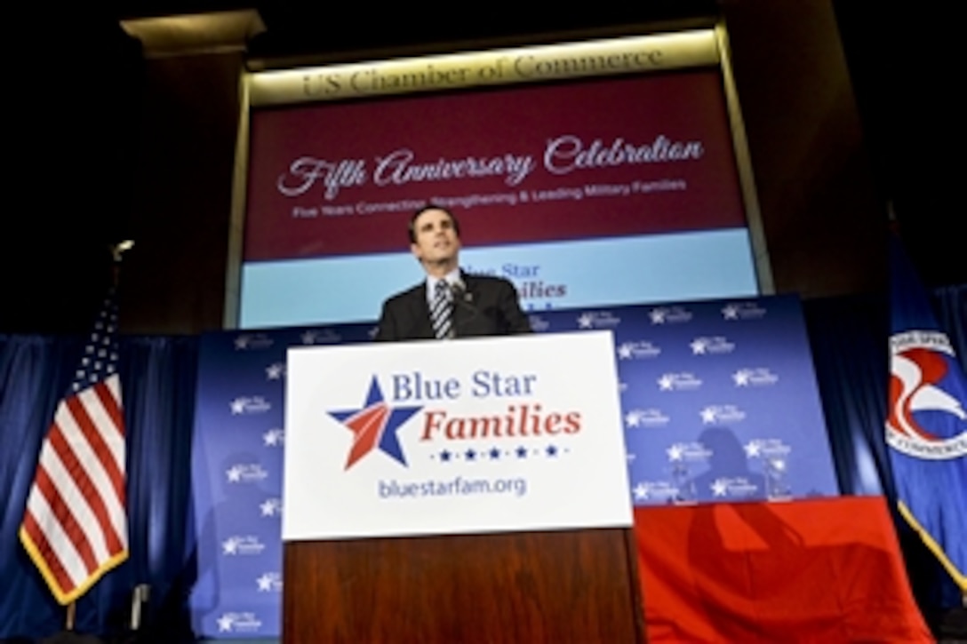 Bob Woodruff, an American journalist injured in Iraq by a roadside bomb, emcees the Blue Star Families Fifth Anniversary Celebration in Washington, D.C., Feb. 24, 2014.