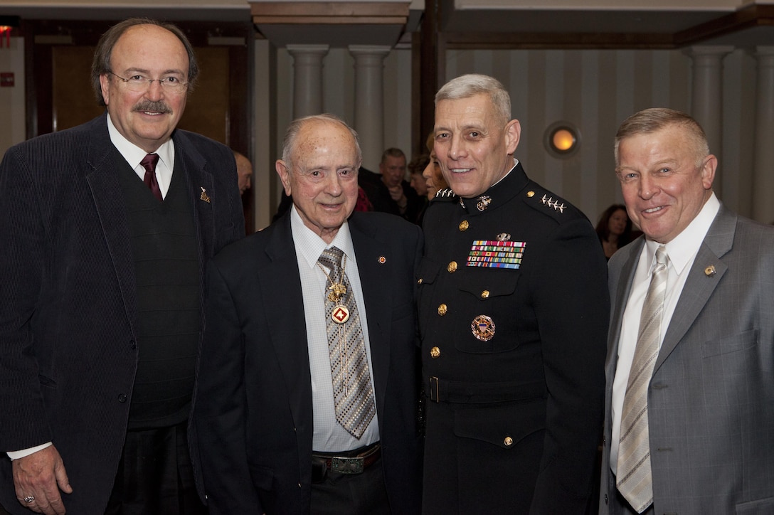 The Assistant Commandant of the Marine Corps, Gen. John M. Paxton, Jr., center right, poses for a photo during the Iwo Jima 70th Anniversary Banquet hosted by the Iwo Jima Association of America in Arlington, Va., Feb. 21, 2015. (U.S. Marine Corps photo by Sgt. Benjamin H. Hicks/Released)