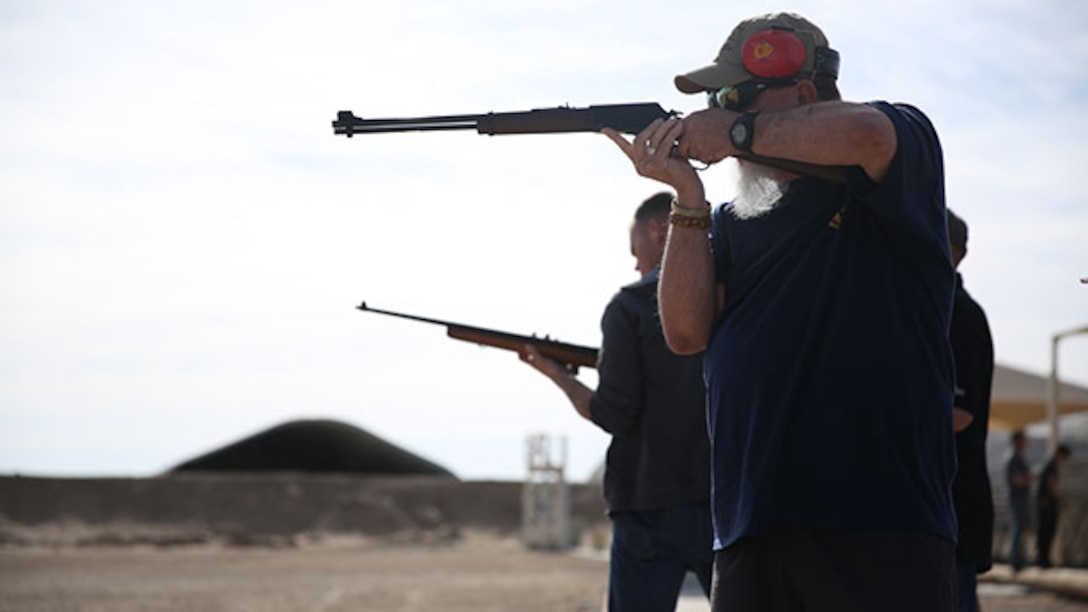 Ret. Gunnery Sgt. Keith Brownmiller shoots at Henry Lever Action .22 caliber rifle during the 3rd annual Smallbore and Air Rifle Competition at Range 3 A, Feb. 21, 2015. Each participant fired a total of 40 rounds during two courses of fire.