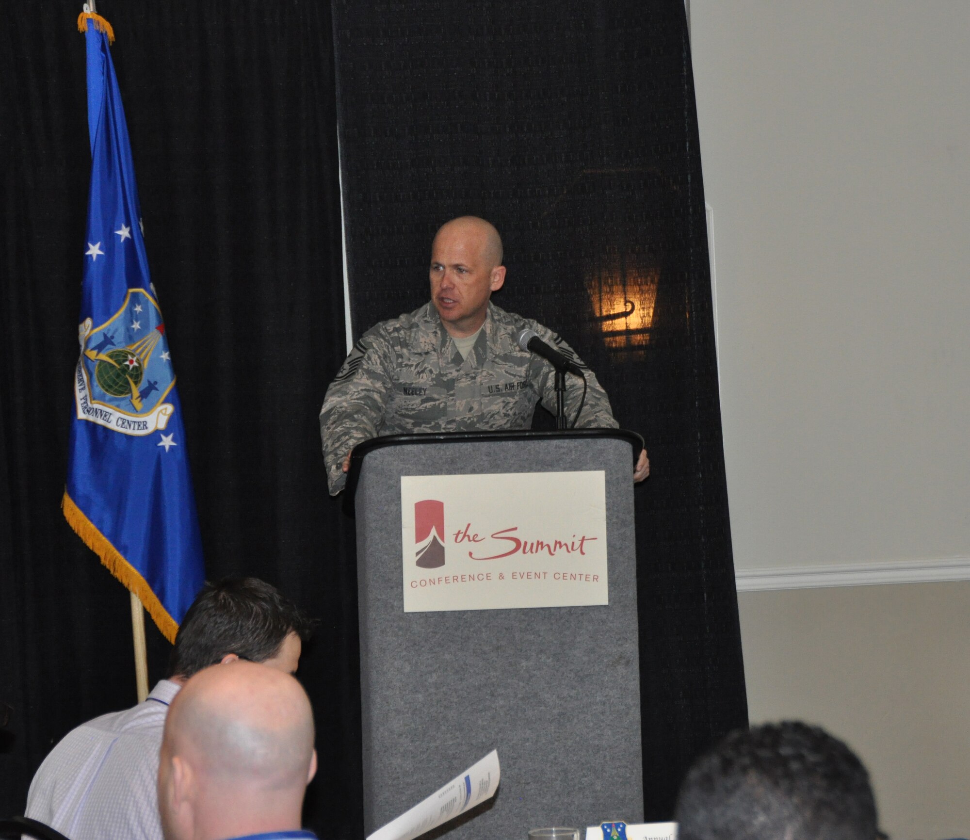 Senior Master Sgt. John Neeley, Air Reserve Personnel Center first sergeant, speaks to attendees during a breakfast honoring ARPC’s A1 annual award winners at the Summit Conference and Event Center Feb. 24, 2015, in Denver. (U.S. Air Force photo/Tech. Sgt. Rob Hazelett)