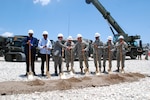 From left to right: Mr. Pierre Michele Laguerre, the director general of the Haiti Ministry of Education, Dr. Gabriel Timonthe, the director general of the Haiti Ministry of Public Health, Mr. David Lindwall, the deputy chief of mission, Army Maj. Gen. Bennett C. Landreneau, the adjutant general of Louisiana National Guard, Army Col. Michael J. Borrel, commander of Task Force Kout Men, Army Brig. Gen. Renaldo Rivera, the adjutant general of the Virgin Islands, Army Brig. Gen. Manuel Ortiz Jr., the deputy commanding general of the U.S. Army South, and Command Sgt. Maj. Tommy Callier, the senior enlisted advisor of the Louisiana National Guard, celebrate after the Task force Kout Men New Horizons 2010 opening ceremony June 15, 2010.
