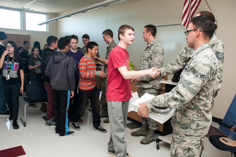 Ellicott Middle School students meet and greet with 2nd Space Operations Squadron Airmen Feb. 19, 2015, at Ellicott, Colo. This was part of the GPS Week’s student outreach events. (U.S. Air Force photo/Staff Sgt. Julius Delos Reyes)