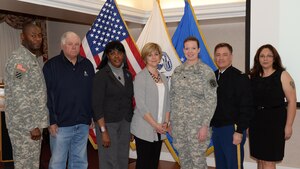 U.S. Army Sgt. Maj. James Jackson, 733rd Mission Support Group command sergeant major and Col. William Galbraith, 733rd MSG commander, recognized volunteers during a quarterly ceremony hosted at Fort Eustis, Va., Feb. 24, 2015. The winners included Larry Sigmon from Outdoor Recreation, Shirley Smith from the Military Personnel Branch, Mendie Pedigo from the Fort Eustis Spouses' Club, Spc. Stacy Mulvaney from the Regimental Memorial Chapel and Raquel Tamayo from Army Community Service. (U.S. Air Force photo by Staff Sgt. Teresa J. Cleveland/Released)