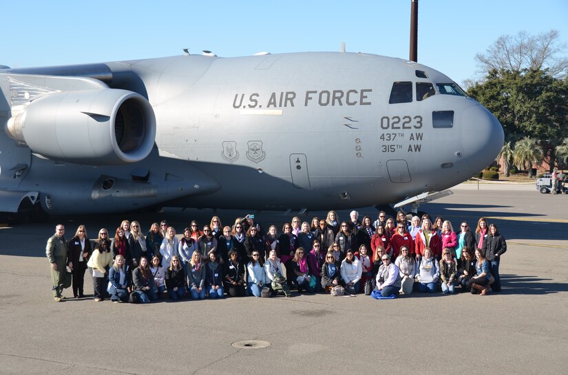 Key spouses from Joint Base Charleston took part in a Key Spouse Incentive Flight Feb. 7, 2015. The flight was hosted by the 15th Airlift Squadron and provided the key spouses with the opportunity to see first hand the mission they enable. The flight included an airdrop and flying along the South Carolina coastline with the cargo doors open. (Courtesy photo) 