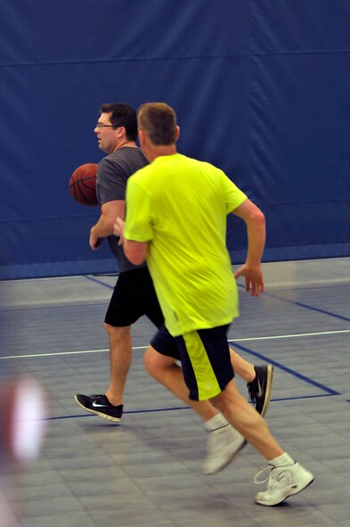 MCGHEE TYSON AIR NATIONAL GUARD BASE, Tenn. - Tech. Sgt. Charles Givins makes a run toward the basket. Airmen and civilian staff from all three divisions at the I.G. Brown Training and Education Center joined at Wilson Hall here Feb. 25 for a basketball game. (U.S. Air National Guard photo by Master Sgt. Mike R. Smith/Released)