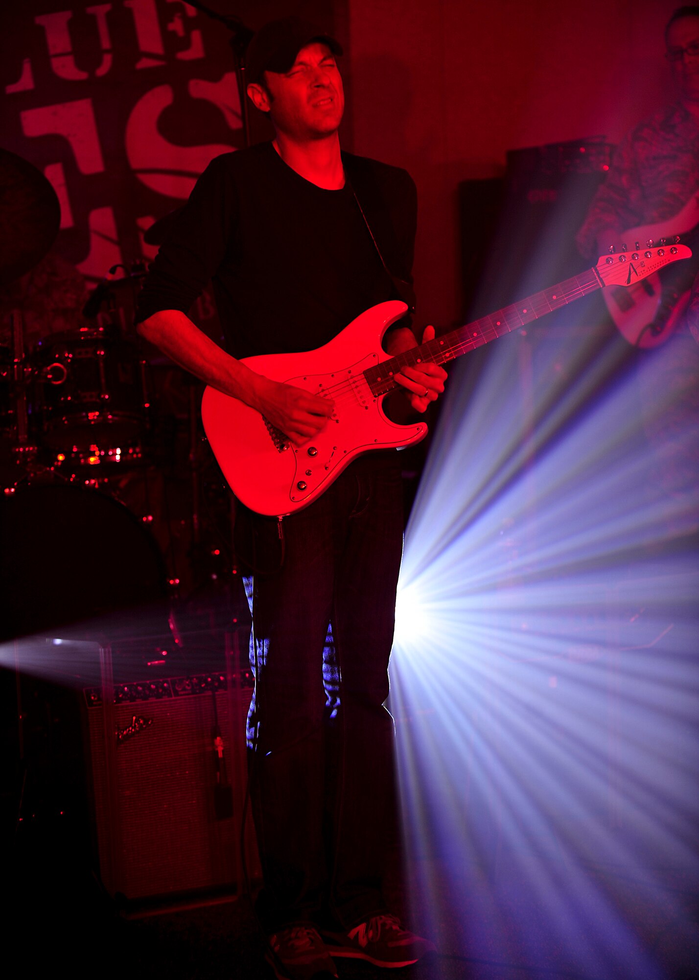 Jake Cinninger, Umphrey’s McGee member, plays the guitar with U.S. Air Force Heritage of America Band Blue Aces, during a musical performance at Langley Air Force Base, Va., Feb. 12, 2015. While visiting Langley, Cinninger spoke about his passion for playing and shared musical advice with the members of the Blue Aces. (U.S. Air Force photo by Airman 1st Class Breonna Veal/Released)