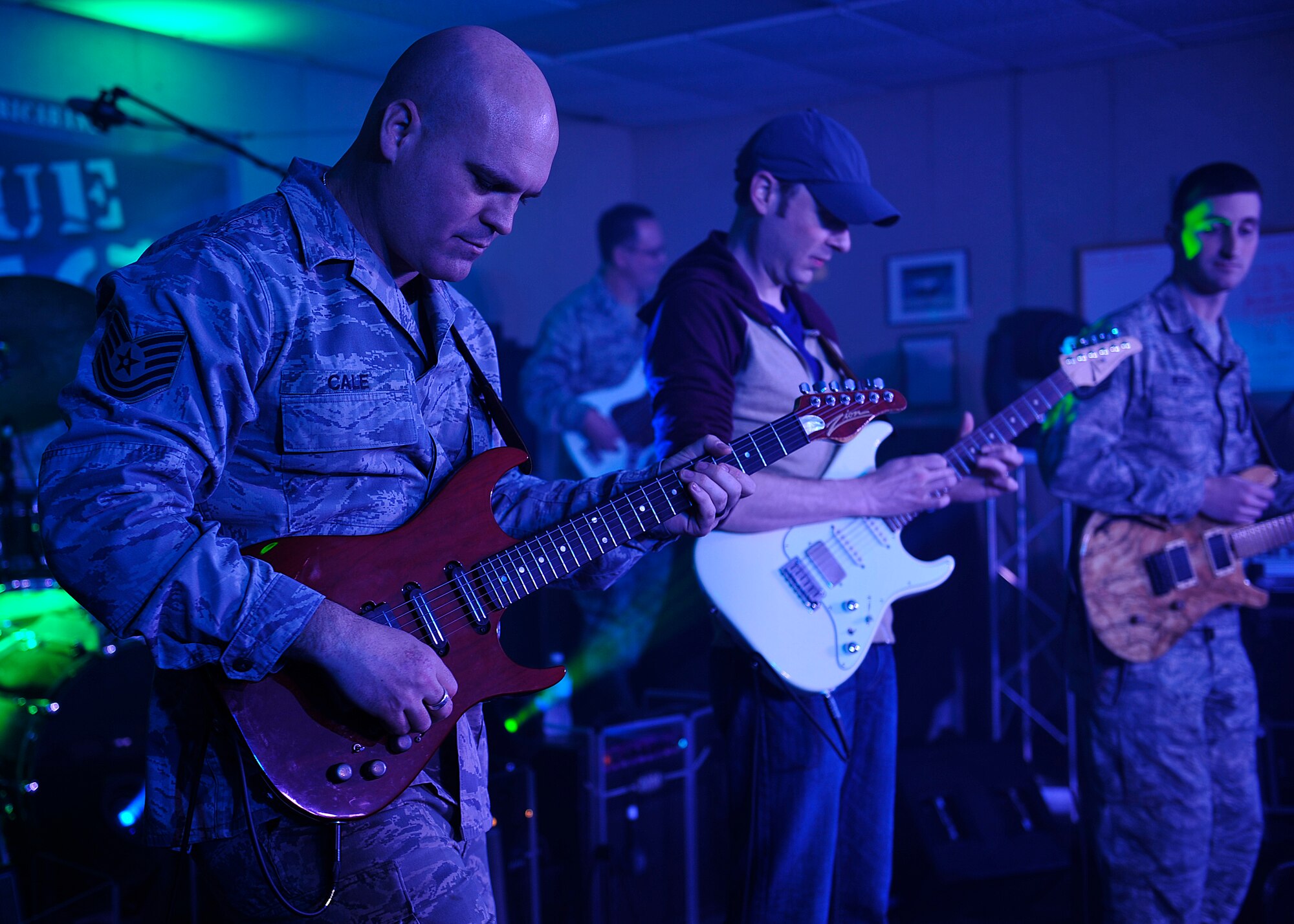 U.S. Air Force Heritage of America band, the Blue Aces, perform with Jake Cinninger, Umphrey’s McGee’s lead guitarist, during a musical performance at Langley Air Force Base, Va., Feb. 12, 2015. The Blue Aces have performed for military and civilian distinguished guests, including local and state officials, U.S. Congressmen, foreign air force chiefs and foreign government officials, the Chairman of the U.S. Joint Chiefs of Staff, the Secretary of the Air Force and the President of the United States. (U.S. Air Force photo by Airman 1st Class Breonna Veal/Released) 