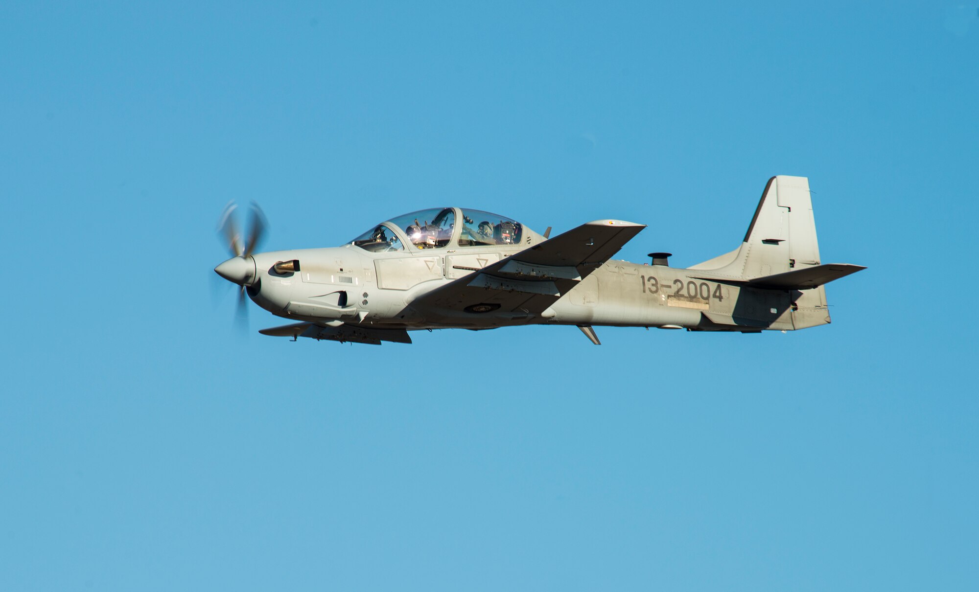 An A-29 Super Tucano performs aerial maneuvers during a light air support training Feb. 20, 2015, at Moody Air Force Base, Ga. The A-29 will provide offensive and defensive aerial fire capabilities when employed in Afghanistan. (U.S. Air Force photo by Airman 1st Class Ceaira Tinsley/Released)