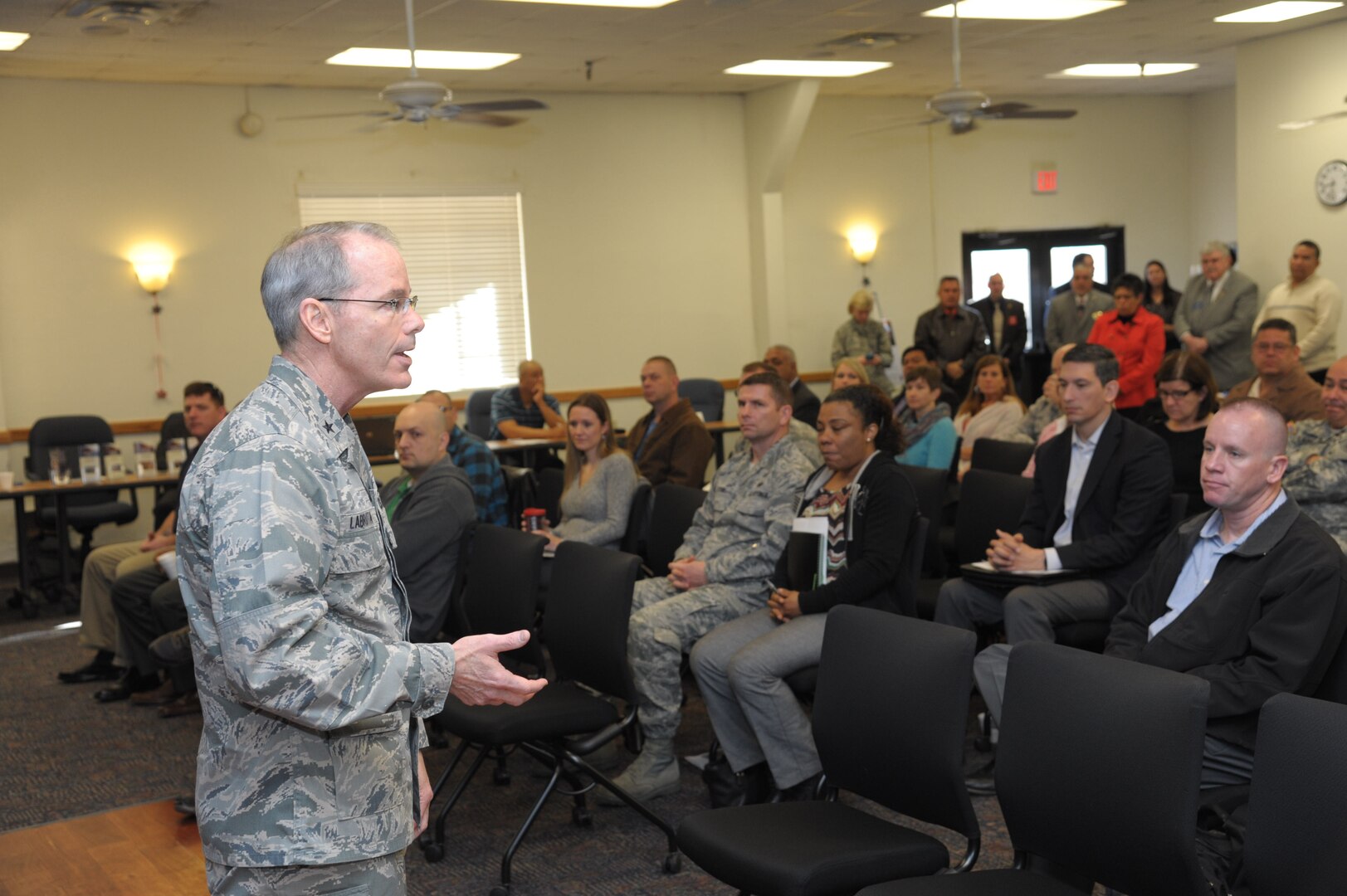 Brig. Gen. Bob LaBrutta, 502nd Air Base Wing and Joint Base San Antonio commander, addresses active and retired service members at the opening of the Transition Information Program Feb. 18 at the JBSA-Randolph Military & Family Readiness Center.  (U.S. Air Force photo by Joel Martinez)
