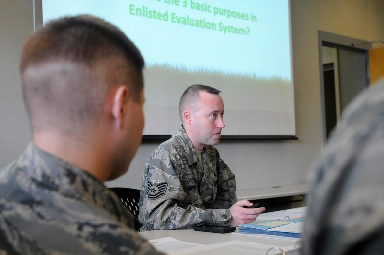 GULFPORT, Miss. - Tech. Sgt. Joshua Hatcher, instructor for the Paul H. Lankford Enlisted PME Center, teaches a lesson here Feb. 9, 2015, during Airman leadership school for satellite students at the Gulfport Combat Readiness Training Center. Hatcher and other instructors from the I.G. Brown Training and Education Center traveled here to graduate 56 students from satellite ALS. (U.S. Air National Guard photo by Master Sgt. Matt Schwartz/Released)