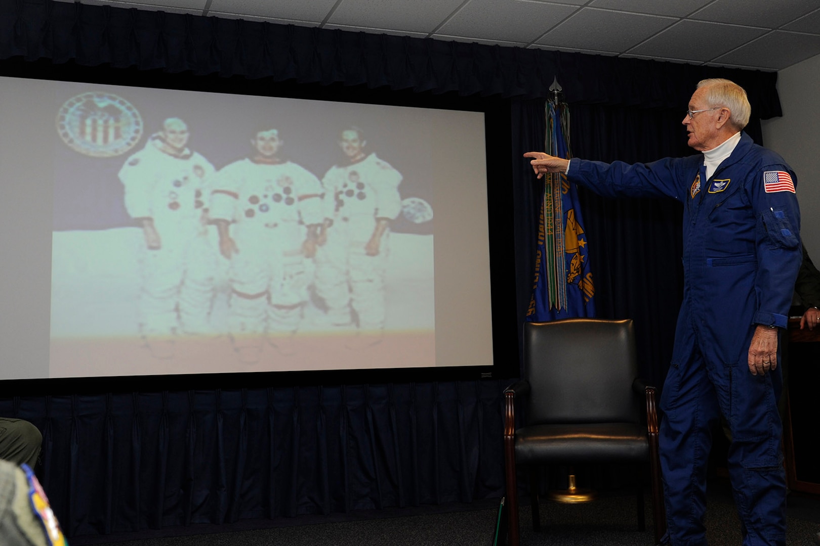 Retired Air Force Brig. Gen. Charlie Duke, Apollo 16 astronaut and 10th person to walk on the moon, talks about his journey and experiences as an astronaut Feb. 20 during a 12th Flying Training Wing professional development seminar. The goal of the seminar was to teach attendees how to lead in times of crisis. (U.S. Air Force photo by Harold China)