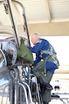Retired Air Force Brig. Gen. Charlie Duke, Apollo 16 astronaut and 10th person to walk on the moon, climbs into a 560th Flying Training Squadron T-38 Talon before an incentive flight Feb. 19 at Joint Base San Antonio-Randolph. Duke visited JBSA-Randolph to serve as the main speaker during a 12th FTW professional development seminar Feb. 20. (U.S. Air Force photo by Airman 1st Class Alexandria Slade)