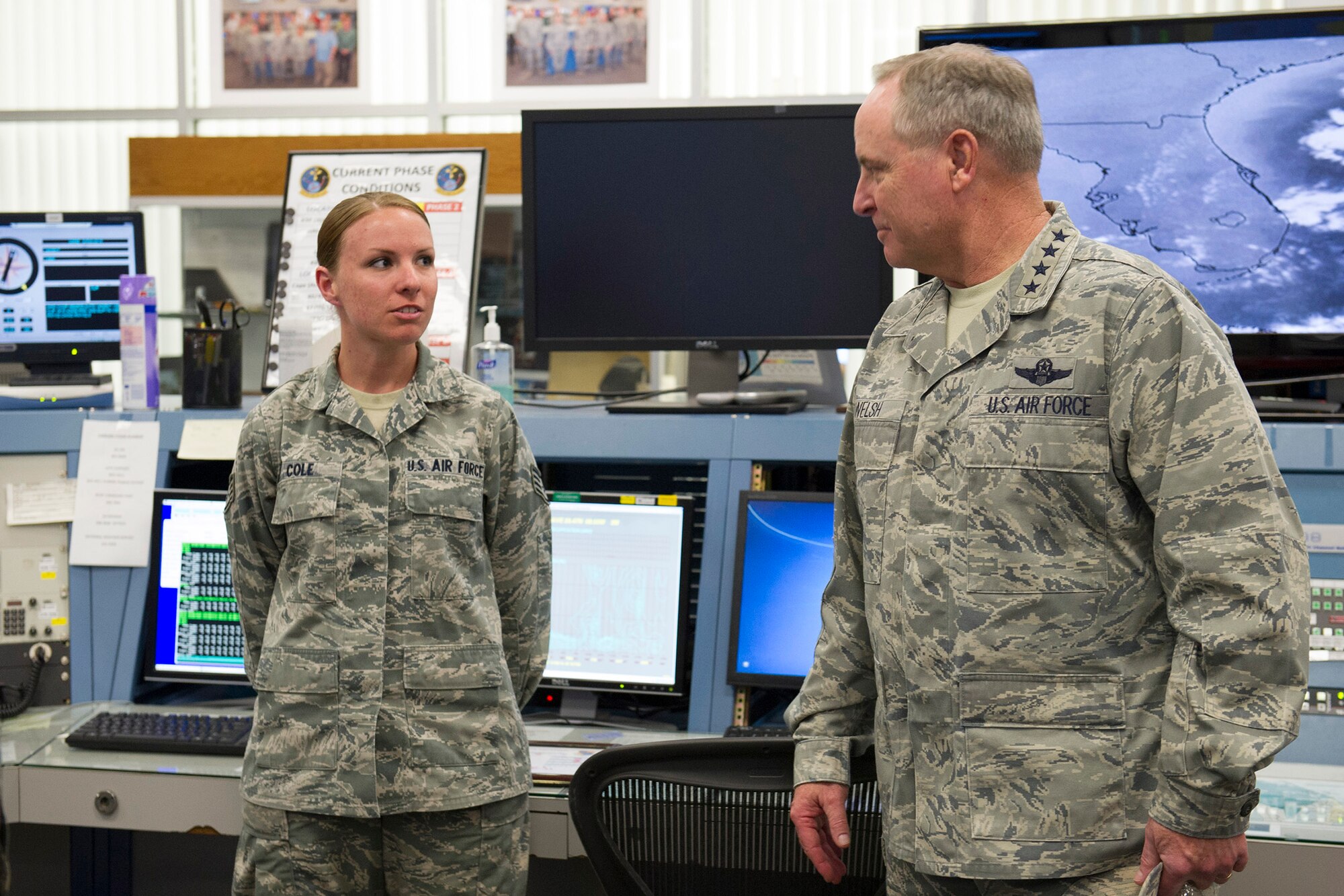 Air Force Chief of Staff Gen. Mark A. Welsh III listens as Staff Sgt. Stephanie Cole, range weather forecaster, 45th Weather Squadron, discusses the complexities of monitoring weather for space flights compared to non-space related weather flights during the chief of staff’s visit to Cape Canaveral Air Force Station Feb. 8, 2015. (U.S. Air Force photo/Matthew Jurgens)
