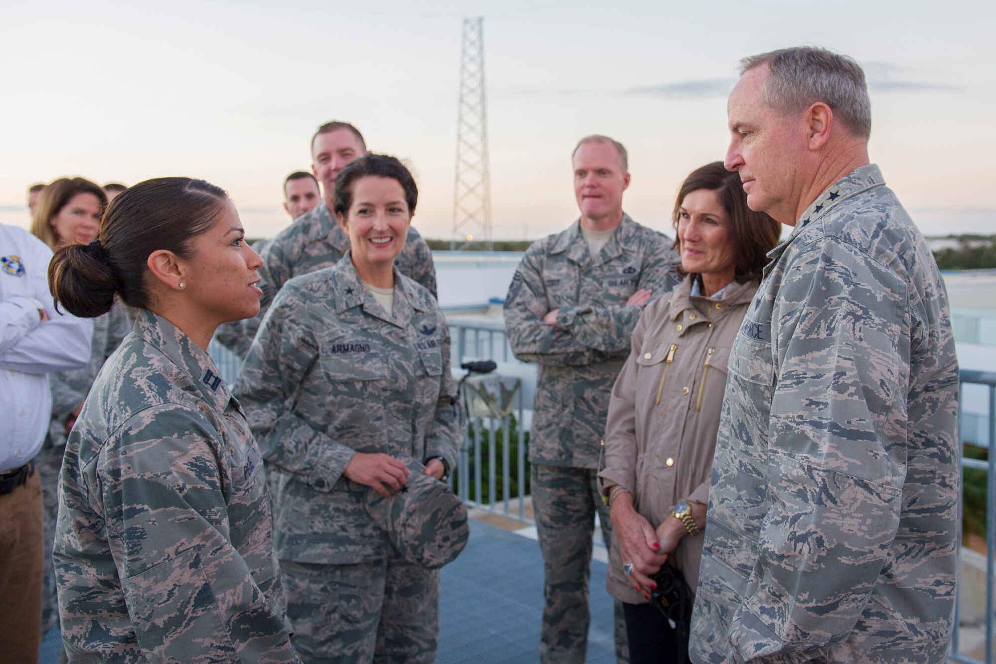 Air Force Chief of Staff Gen. Mark A. Welsh III speaks to Capt. Marcianna Pease, 45 Operations Support Squadron, Feb. 8, 2015, on top of the Morrell Operations Center, Cape Canaveral Air Force Station, about the speech he gave at the United States Air Force Academy in 2011 and passes on the gratitude of two officers that asked her to thank Welsh for them.  Welsh’s wife Betty, Chief Master Sgt. of the Air Force James Cody, and 45th Space Wing commander Nina Armagno listen on as she tells her story. (U.S. Air Force photo/Matthew Jurgens)