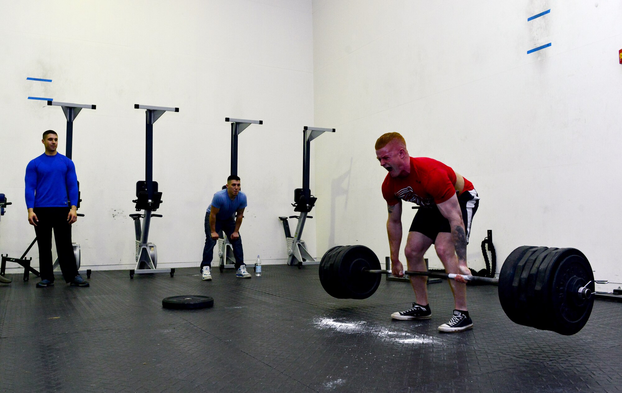 Staff Sgt. Dustin Hughes, 39th Security Forces Squadron defender, performs a deadlift during the 2015 Incirlik Strongman Competition Feb. 23, 2015, at Incirlik Air Base, Turkey. During the competition each participant had three turns per event to lift their maximum weight. (U.S. Air Force photo by Senior Airman Michael Battles)