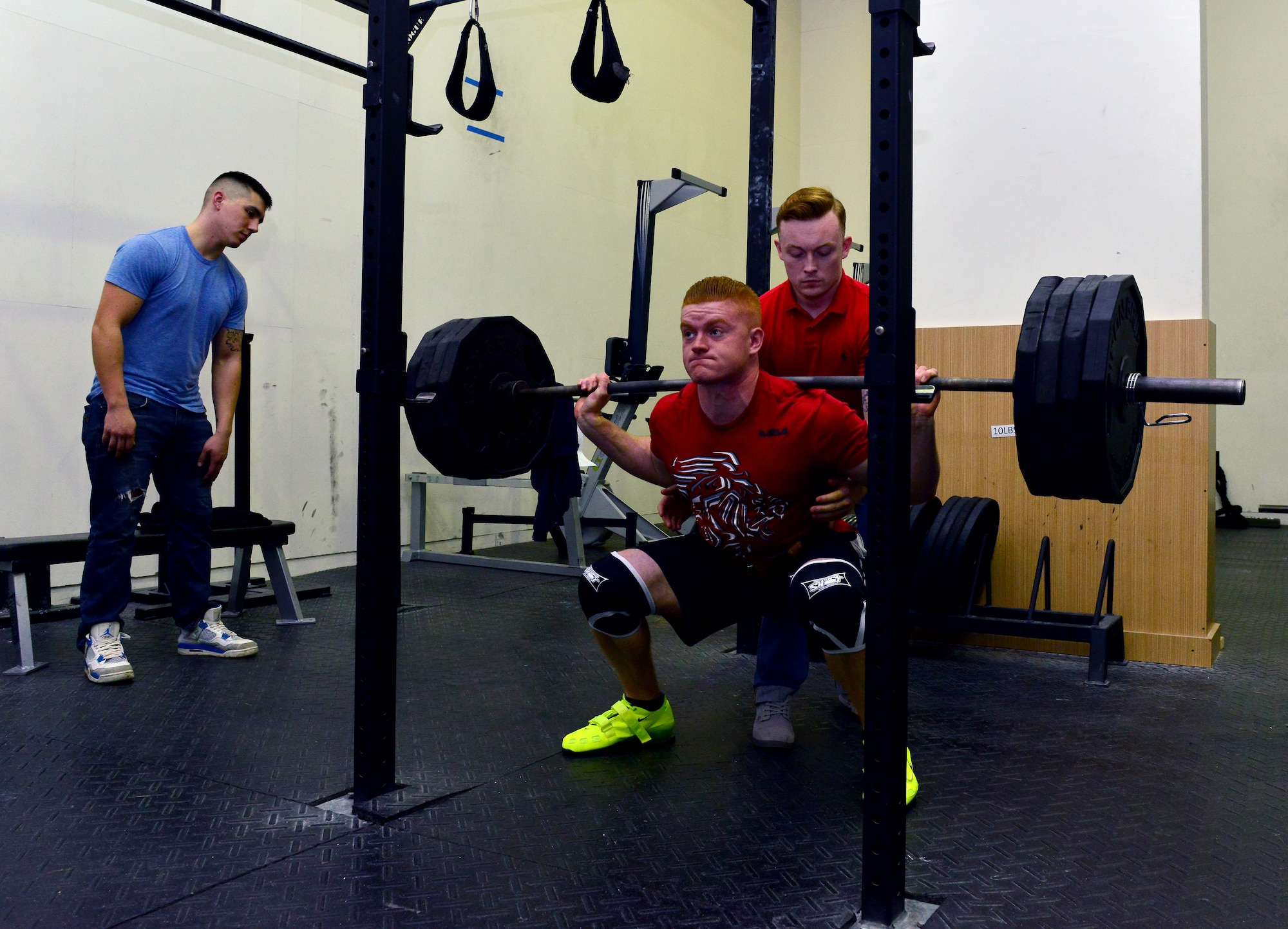 Staff Sgt. Dustin Hughes, 39th Security Forces Squadron defender, performs a squat during the 2015 Incirlik Strongman Competition Feb. 23, 2015, at Incirlik Air Base, Turkey. Hughes competed in the male 196 to 204 pound division. (U.S. Air Force photo by Senior Airman Michael Battles)