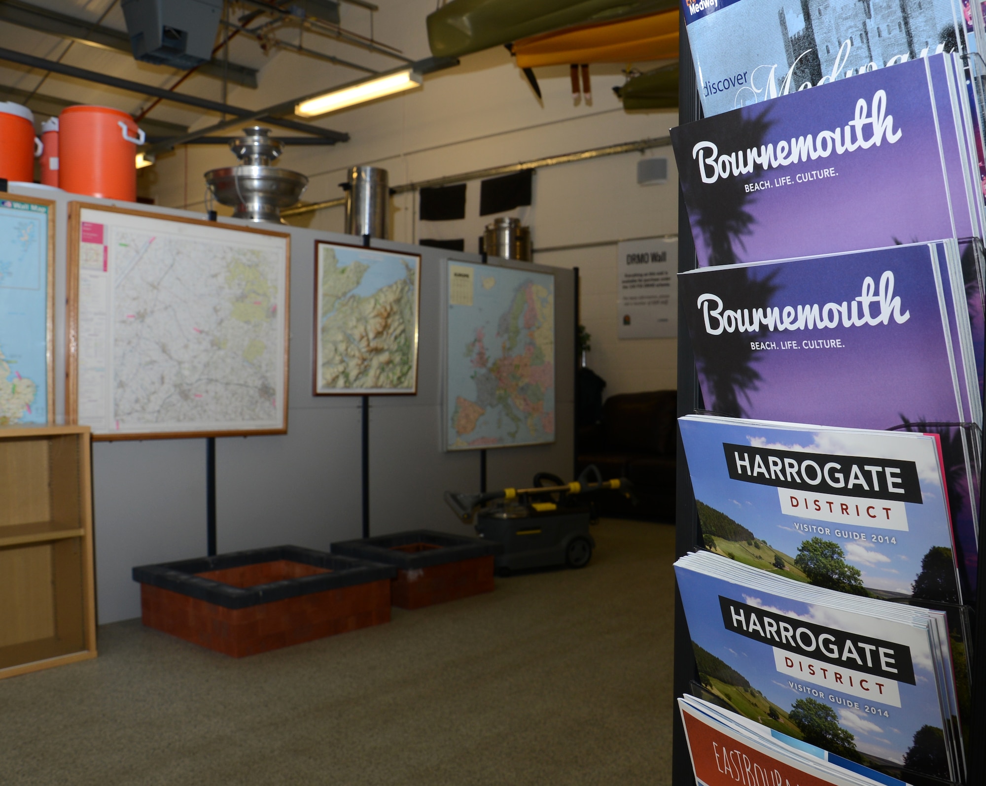 Brochures and maps are displayed in the new 100th Force Support Squadron Information, Tickets and Travel office Feb. 23, 2015, on RAF Mildenhall, England. The ITT office is open from Monday to Friday, 10 a.m. to 4 p.m., but is closed on family days, U.S. federal holidays and goal days. The ITT moved location to share Bldg. 162 with outdoor recreation in order to better serve customers under one roof. (U.S. Air Force photo by Gina Randall/Released)