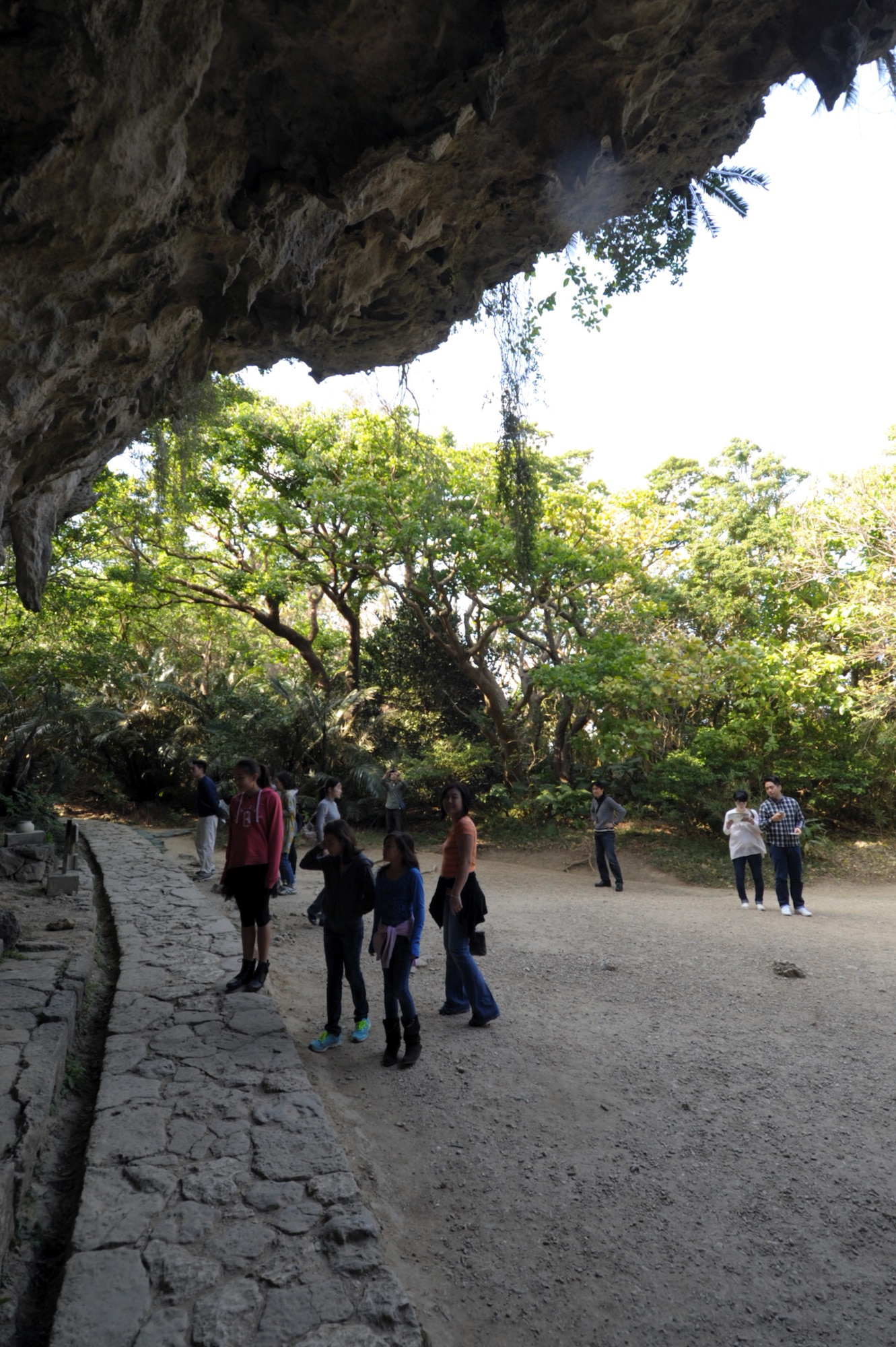 Tourists visit an altar at Sefa-Utaki, on Okinawa, Japan, Feb. 21, 2015. Sefa-Utaki, one of Okinawa’s most significant religious sites, provides a great day trip for those looking to explore the island. (U.S. Air Force photo by Tim Flack)